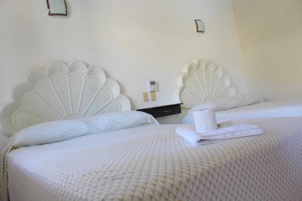 Hotel Albatros ปูแอร์โตเอสกอนดิโด ภายนอก รูปภาพ