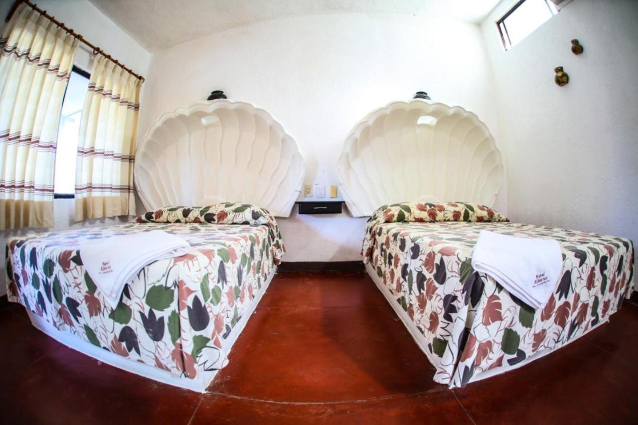 Hotel Albatros ปูแอร์โตเอสกอนดิโด ภายนอก รูปภาพ